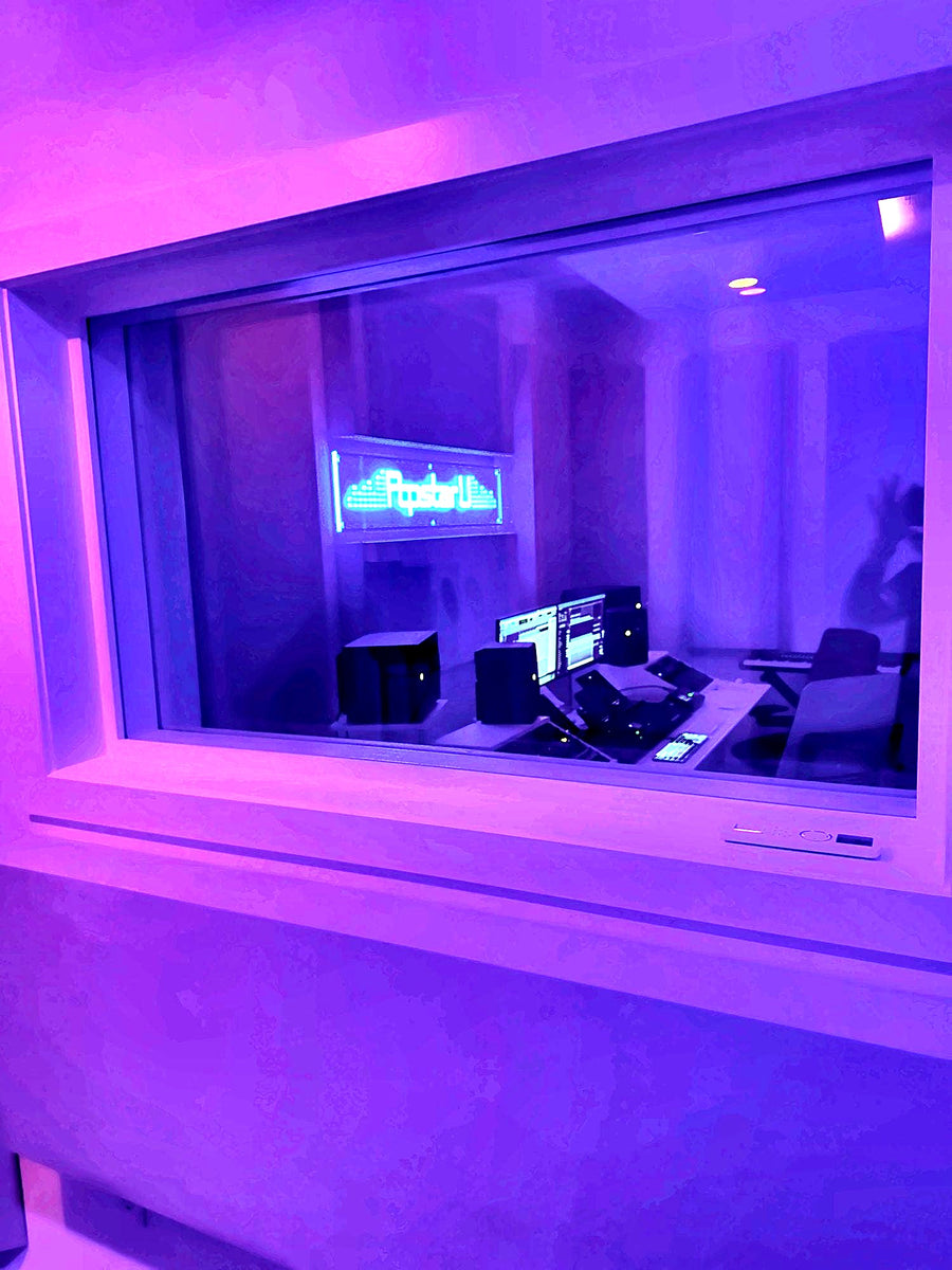 View from the vocal booth window into the control room of the Las Vegas studio