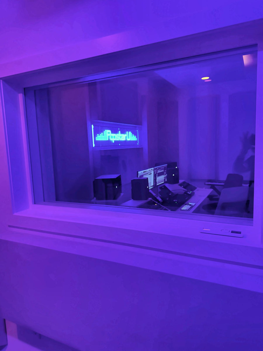 View from the vocal booth window into the control room